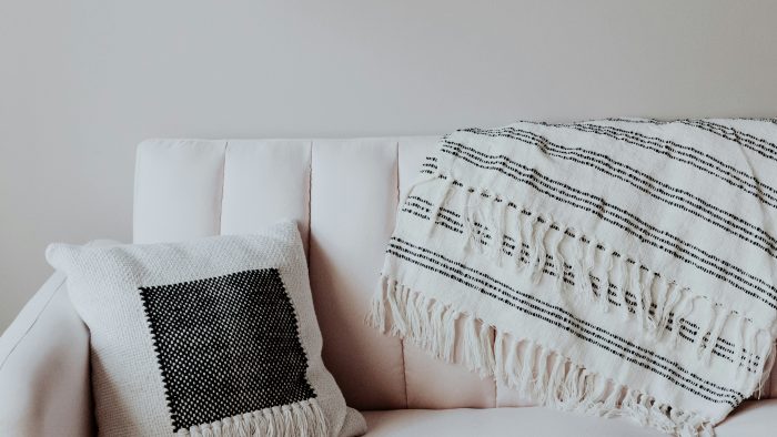 white and black throw pillow